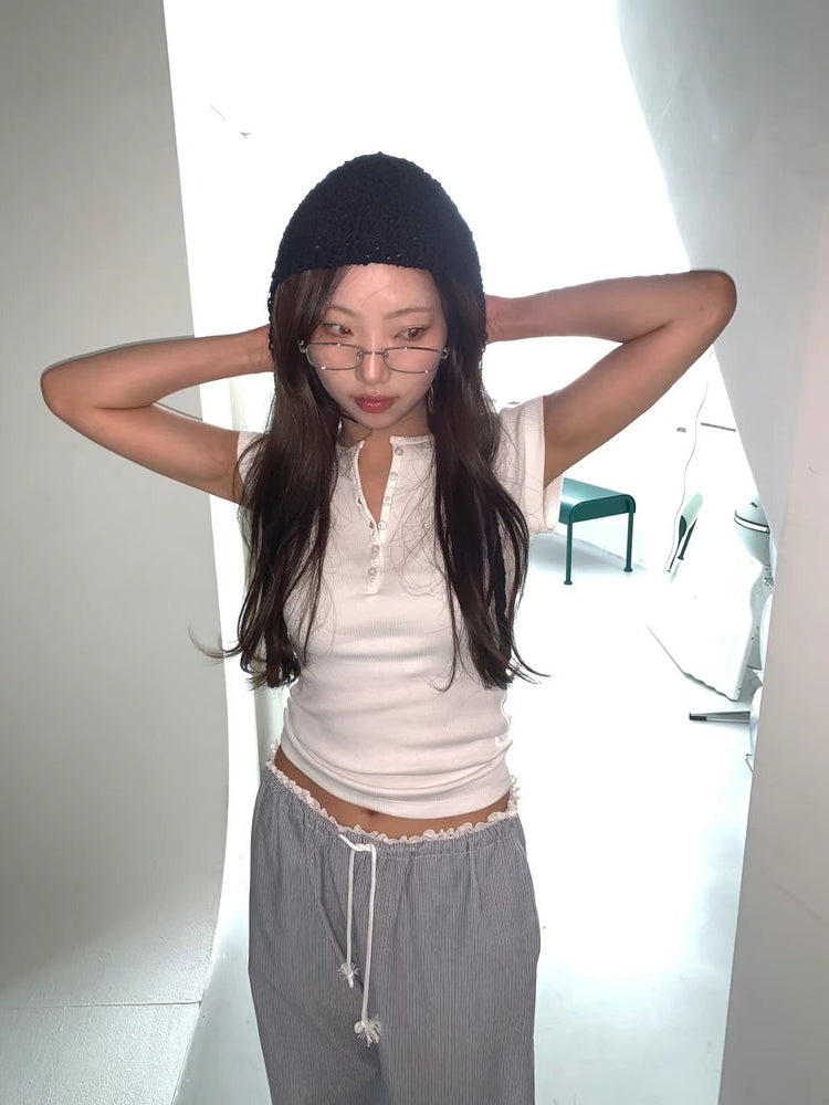 半扣鈕細節修身上衣