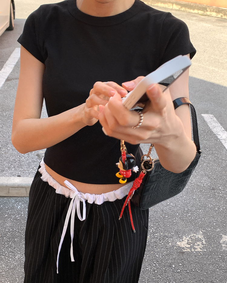 撞色條紋不修邊細節休閒褲