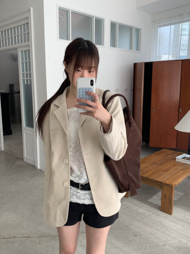 美肩透膚顆粒感細節上衣