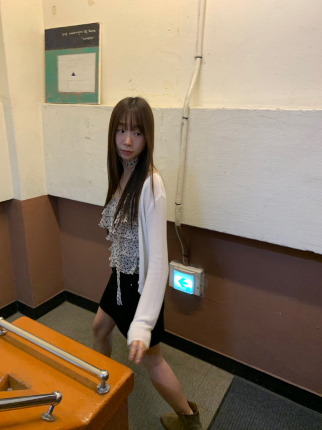 透膚骨感顯瘦排鈕針織外套