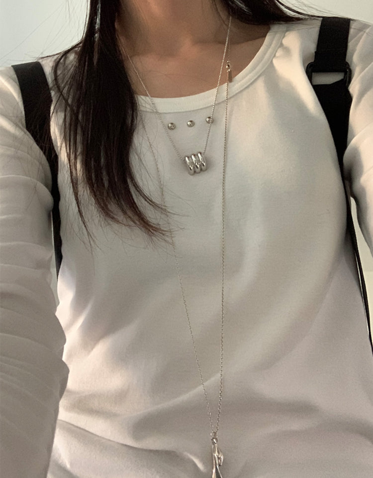 金屬釘細節U領弧下擺上衣