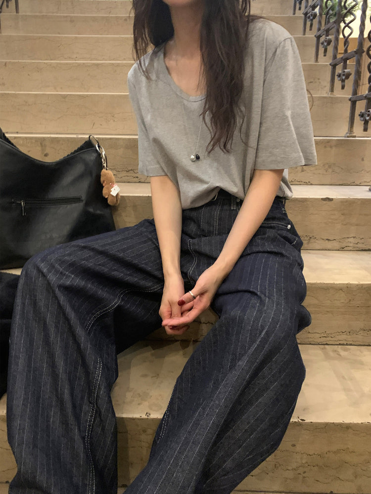暗紋理太陽圖案廓形牛仔褲