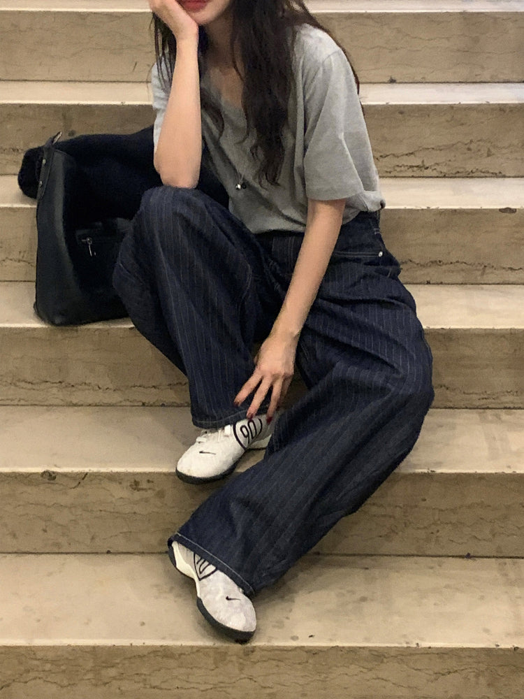 暗紋理太陽圖案廓形牛仔褲