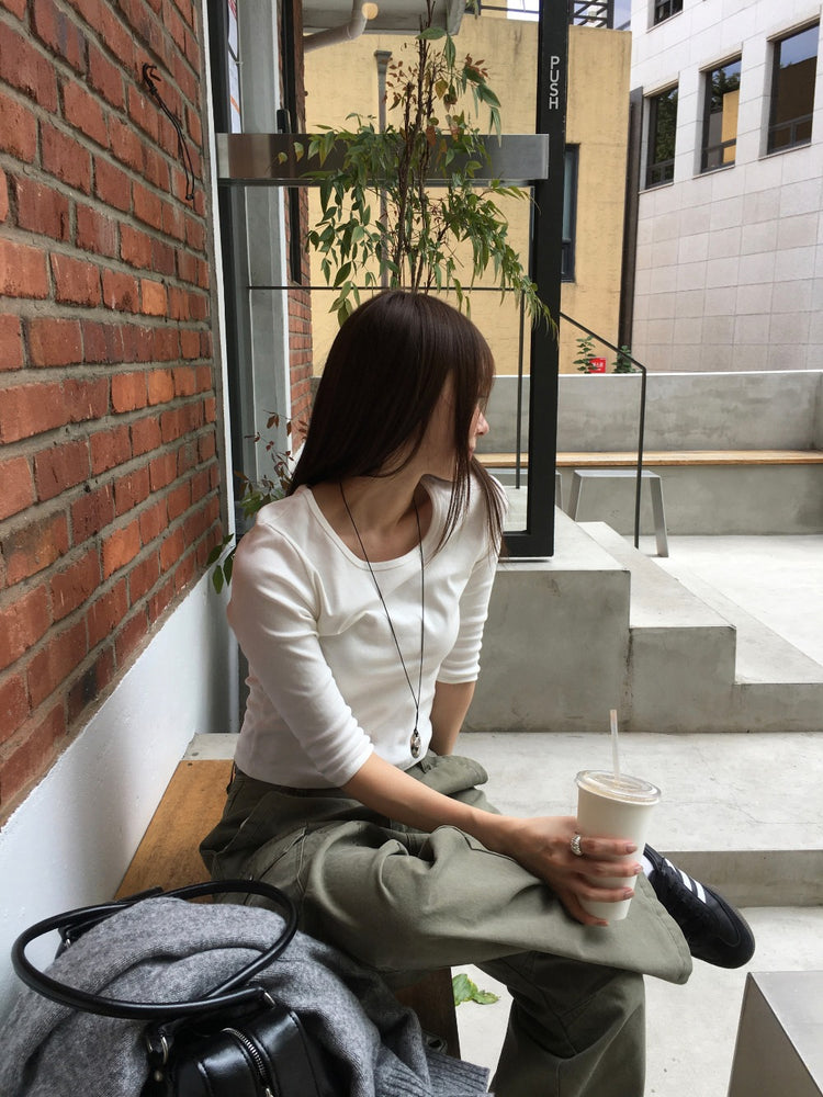 基礎後標籤細節七分袖上衣