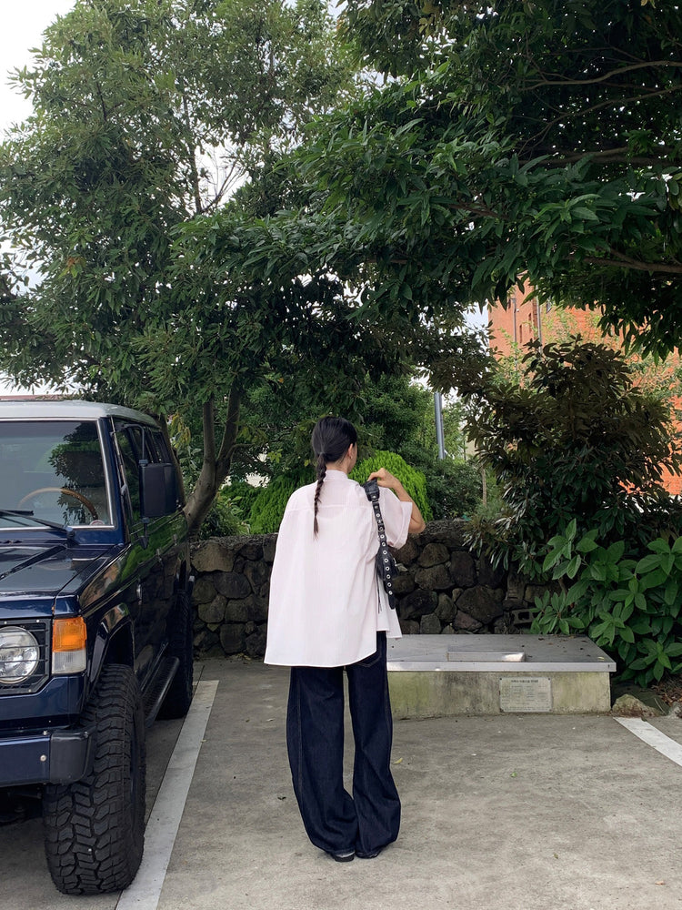 弧壓線細節牛仔褲