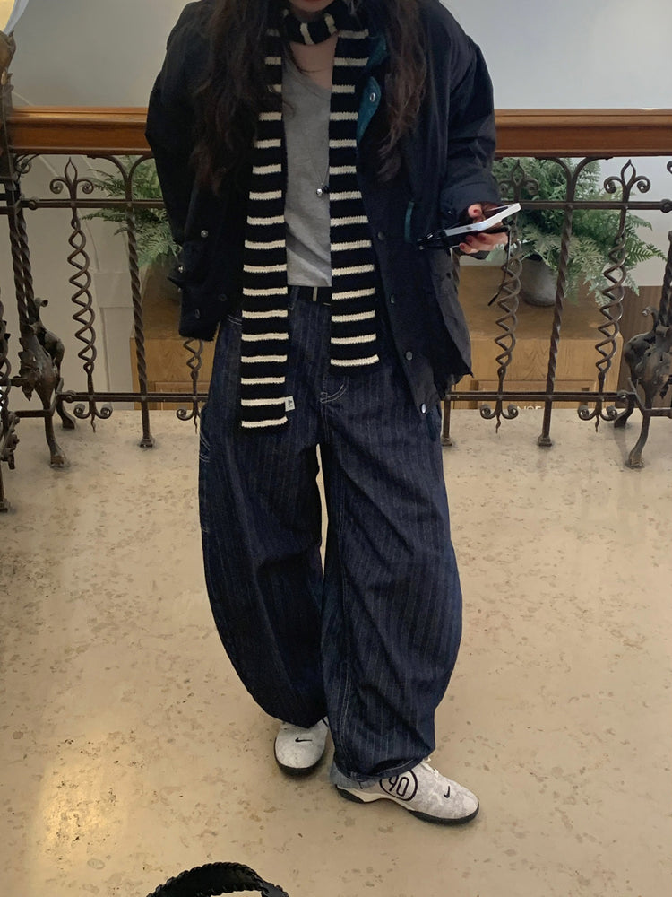 暗紋理太陽圖案廓形牛仔褲