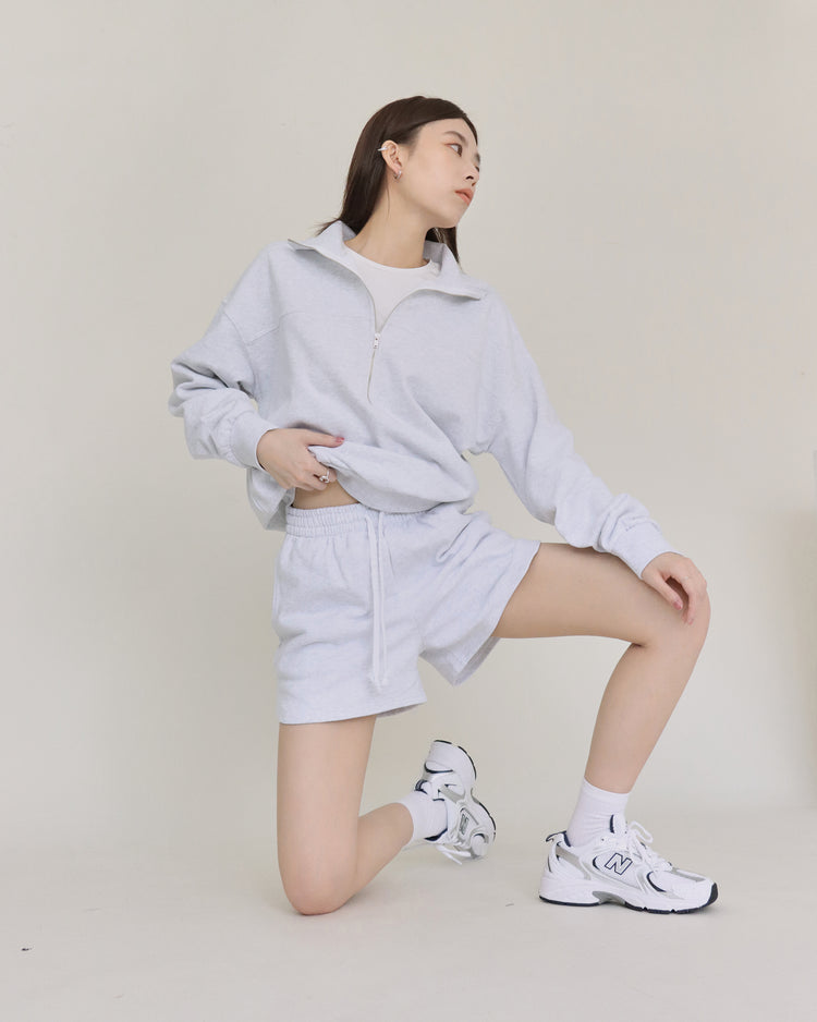 (現)半拉鍊壓線細節休閒套裝-黑