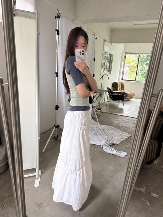 不規則壓線細節及踝蛋糕裙