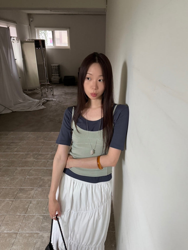 不規則壓線細節及踝蛋糕裙