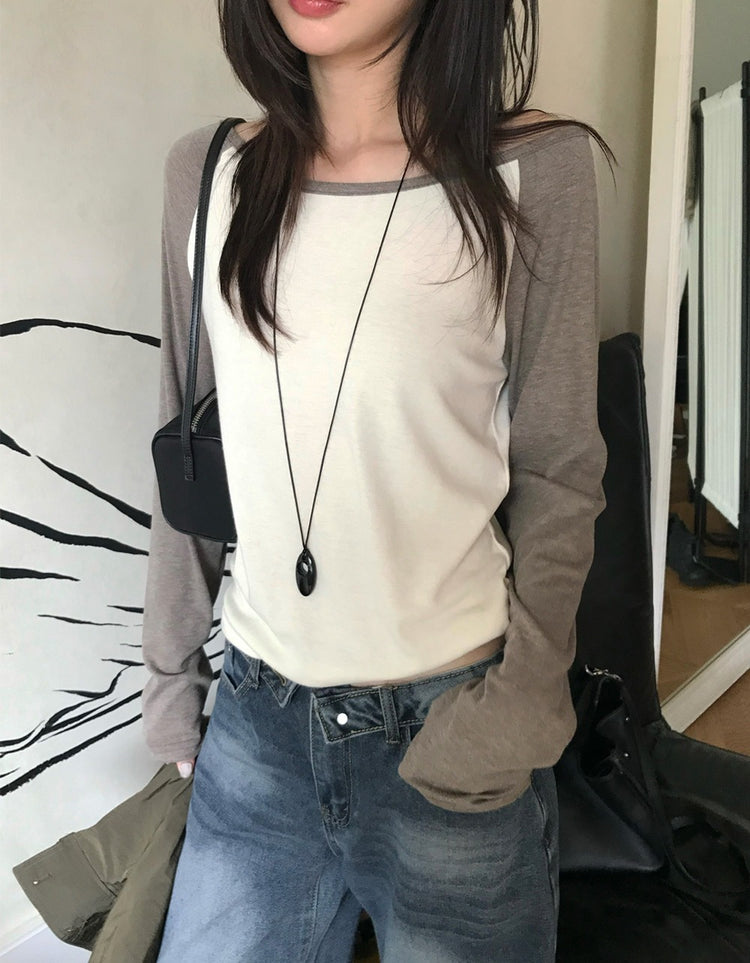 美肩撞色牛角袖細節上衣