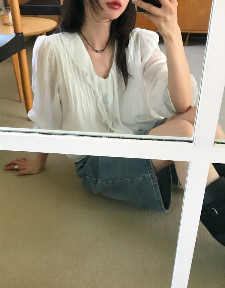 荷葉邊垂帶細節上衣