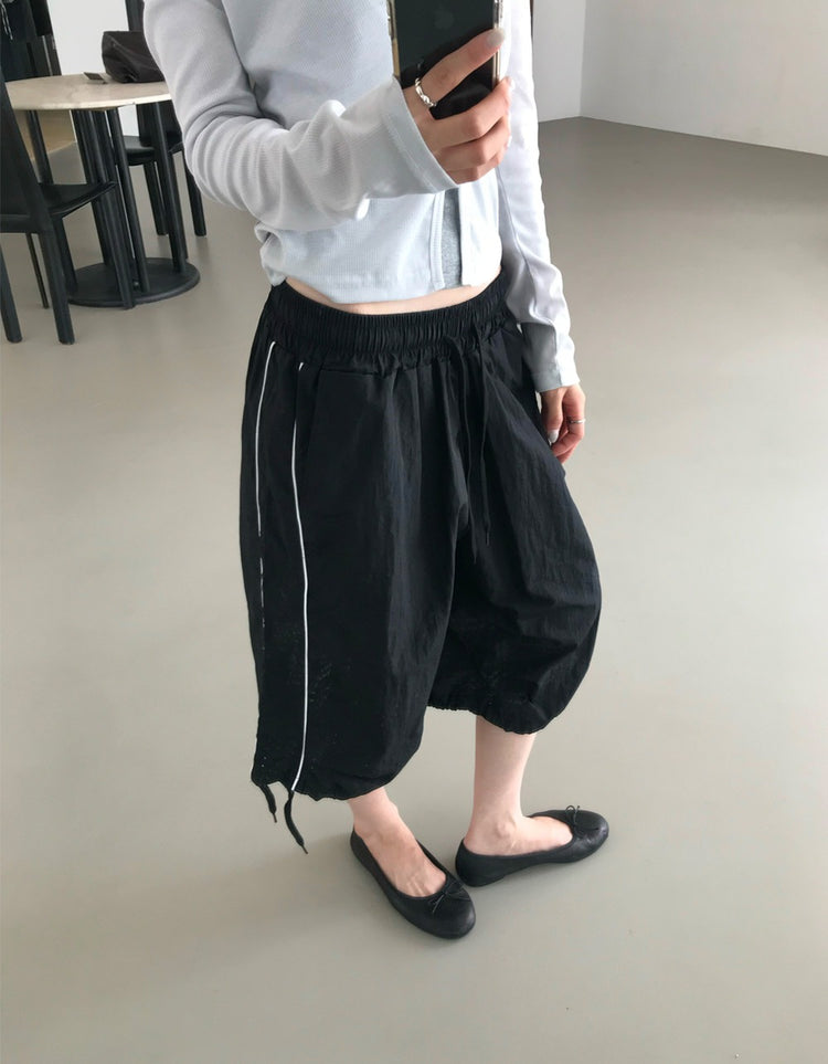 撞色側壓線休閒七分褲