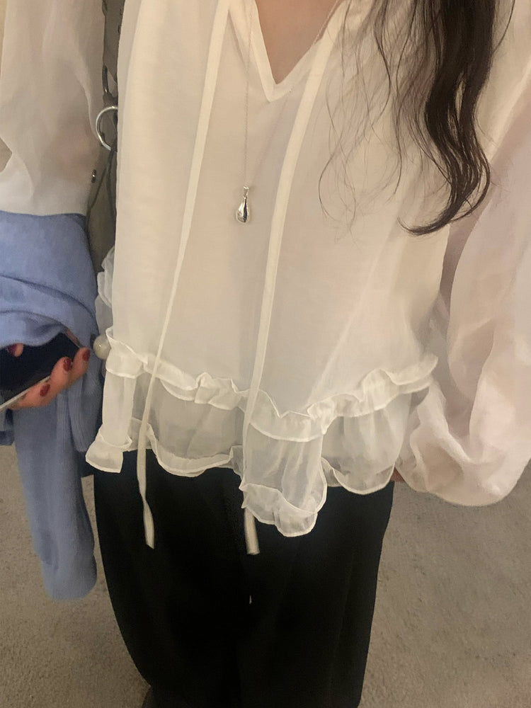微透垂帶荷葉邊細節上衣