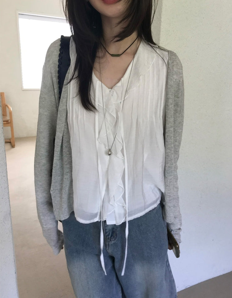 荷葉邊垂帶細節上衣