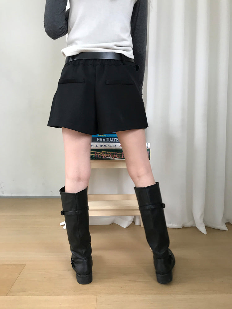 不對稱側扣百褶裙褲