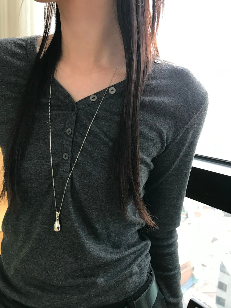 不對稱側扣百褶裙褲