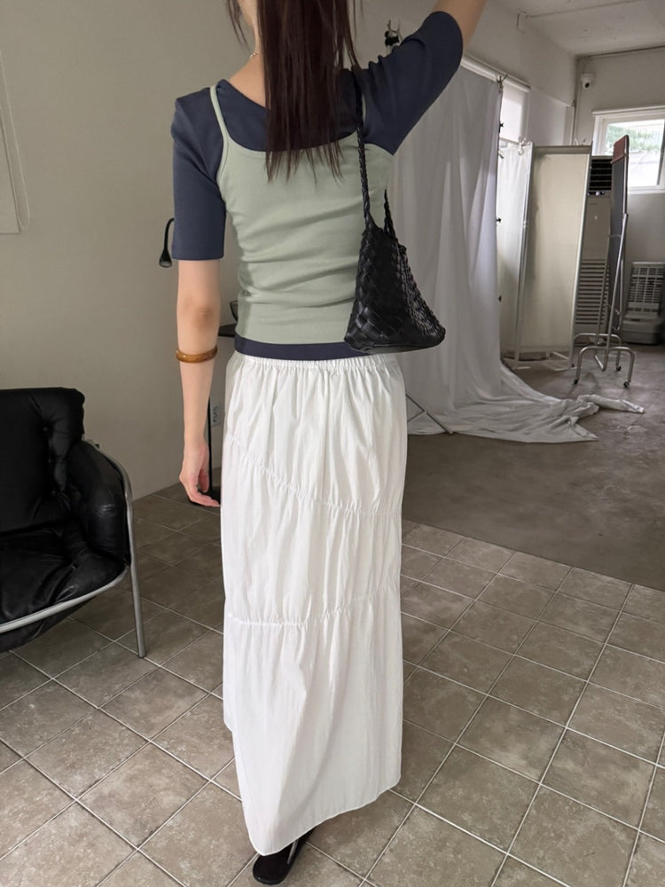 不規則壓線細節及踝蛋糕裙