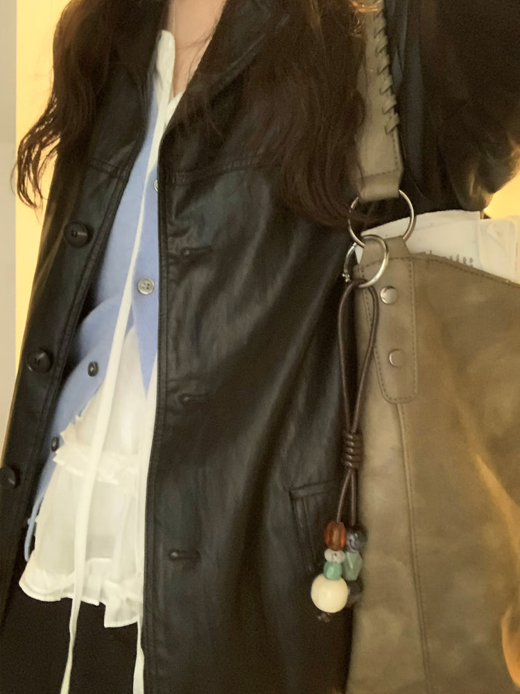 微透垂帶荷葉邊細節上衣