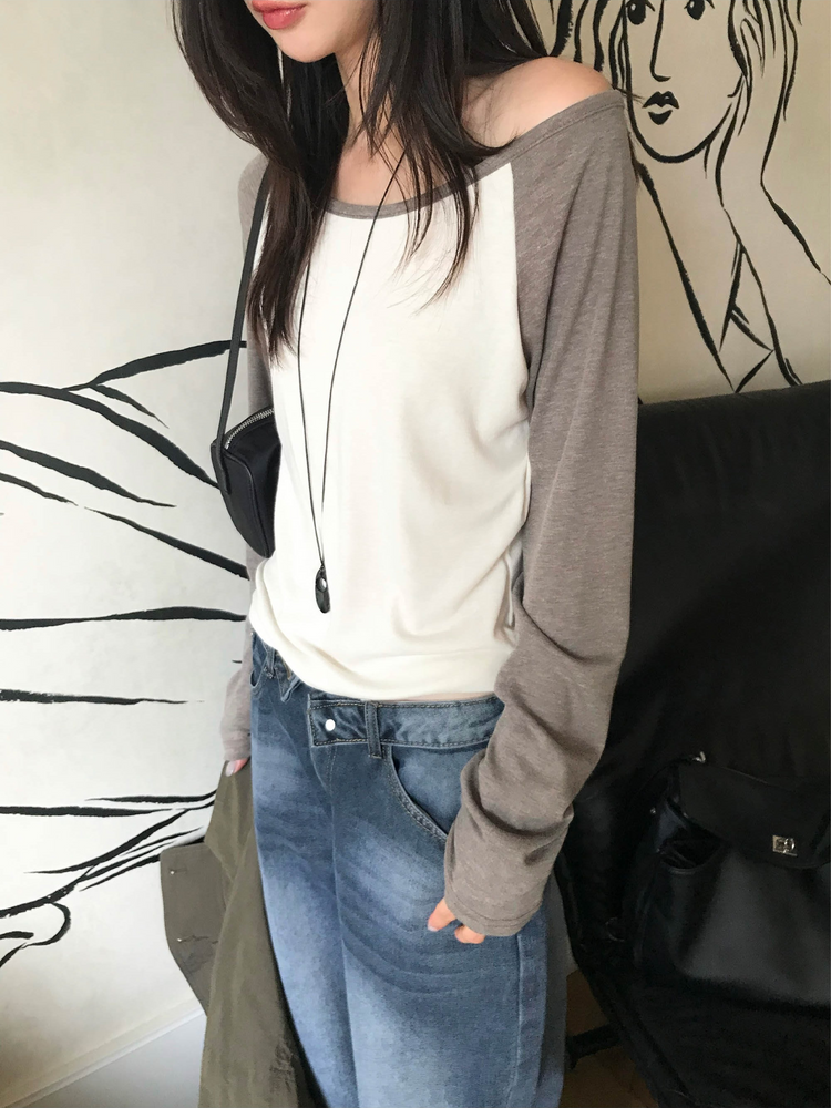 美肩撞色牛角袖細節上衣