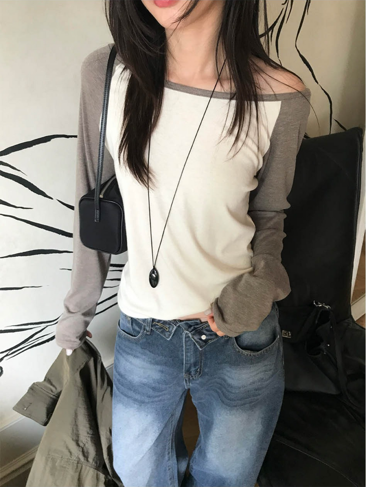 美肩撞色牛角袖細節上衣