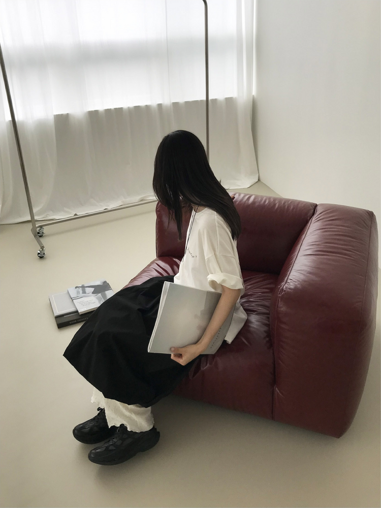 側扣弧壓線細節花苞裙