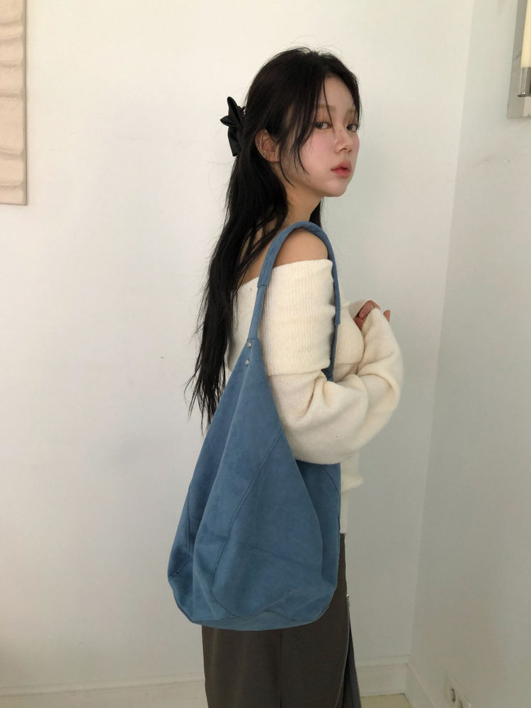 美肩下擺扣鈕細節針織上衣