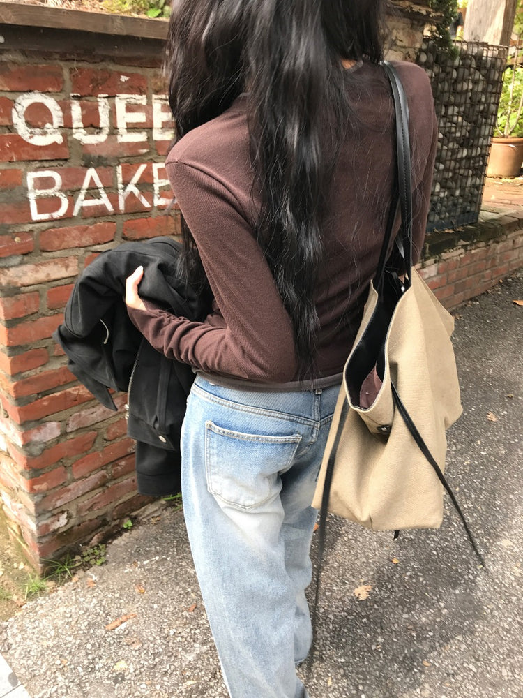 帆布拼接皮垂帶細節大容量袋