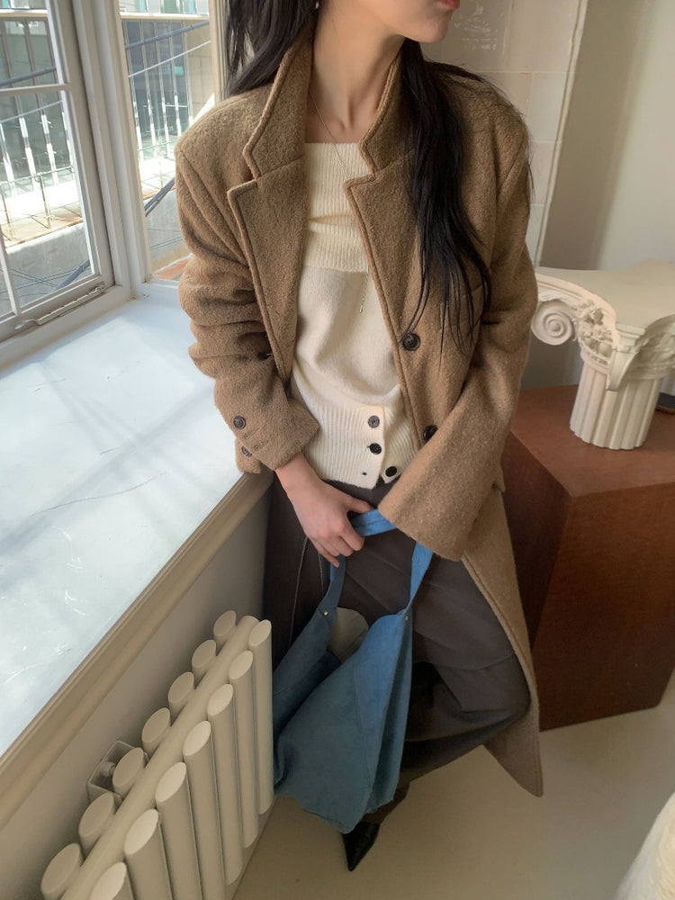 美肩下擺扣鈕細節針織上衣