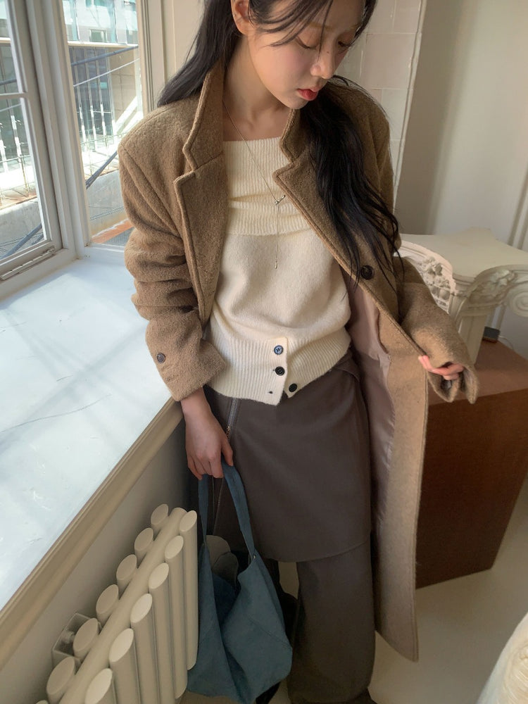 美肩下擺扣鈕細節針織上衣