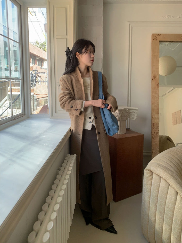 美肩下擺扣鈕細節針織上衣