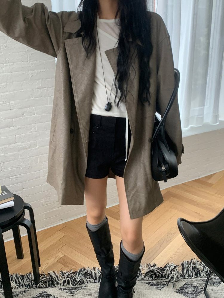 天絲微透膚不對稱垂帶設計上衣